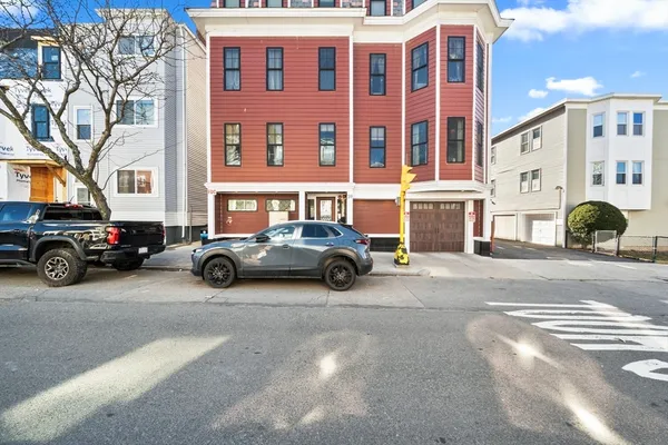 a car parked in front of a building