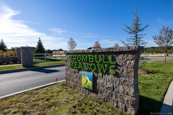 a view of a park with sitting area