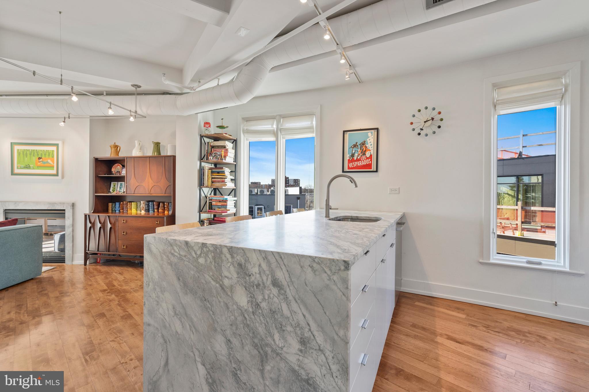 1700 Kalorama Road Northwest, Unit PH502 Washington, DC 20009 - Photo 11 of 50 a spacious bathroom with a tub sink and mirror