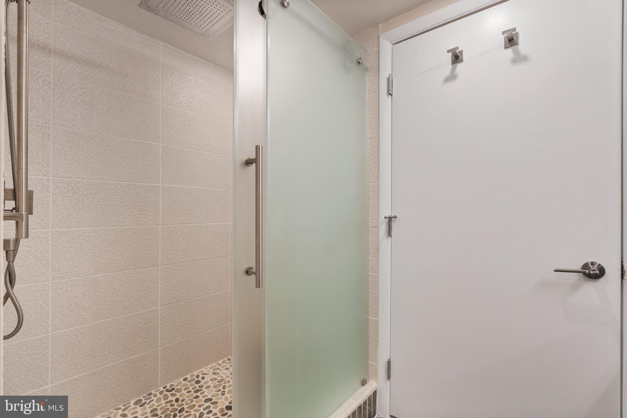 1700 Kalorama Road Northwest, Unit PH502 Washington, DC 20009 - Photo 18 of 50 a bathroom with a shower