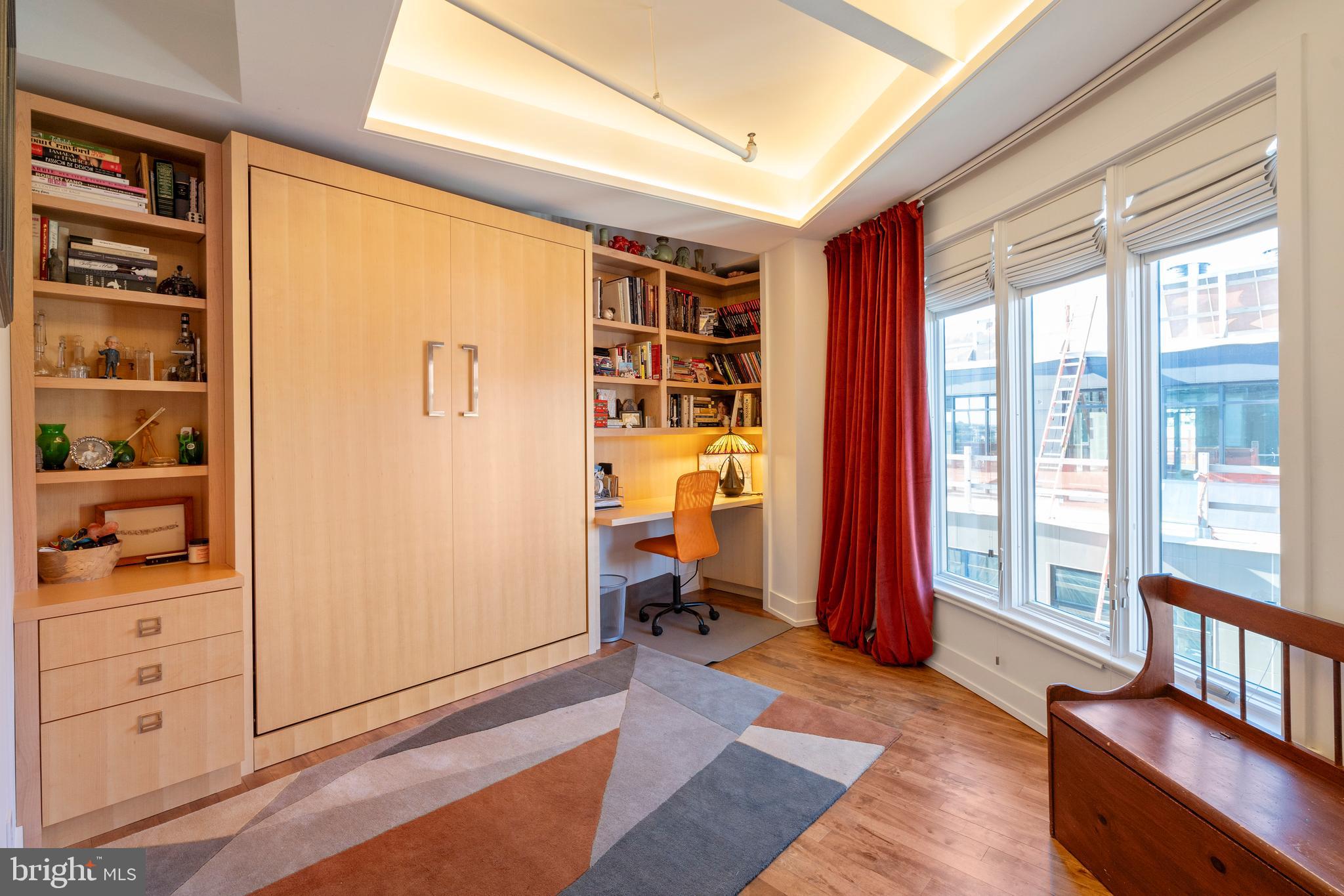 1700 Kalorama Road Northwest, Unit PH502 Washington, DC 20009 - Photo 20 of 50 a living room with furniture and wooden floor
