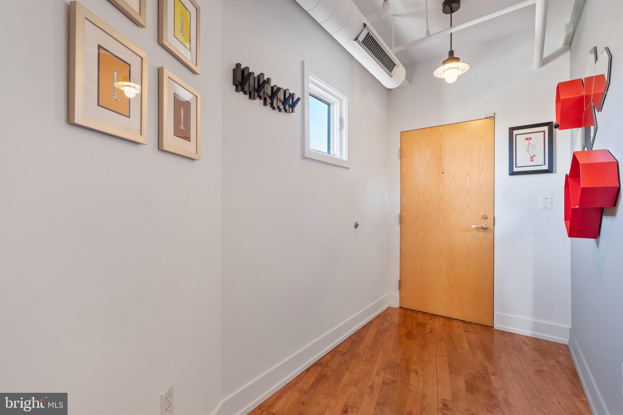 1700 Kalorama Road Northwest, Unit PH502 Washington, DC 20009 - Photo 23 of 50 a view of an entryway with wooden floor