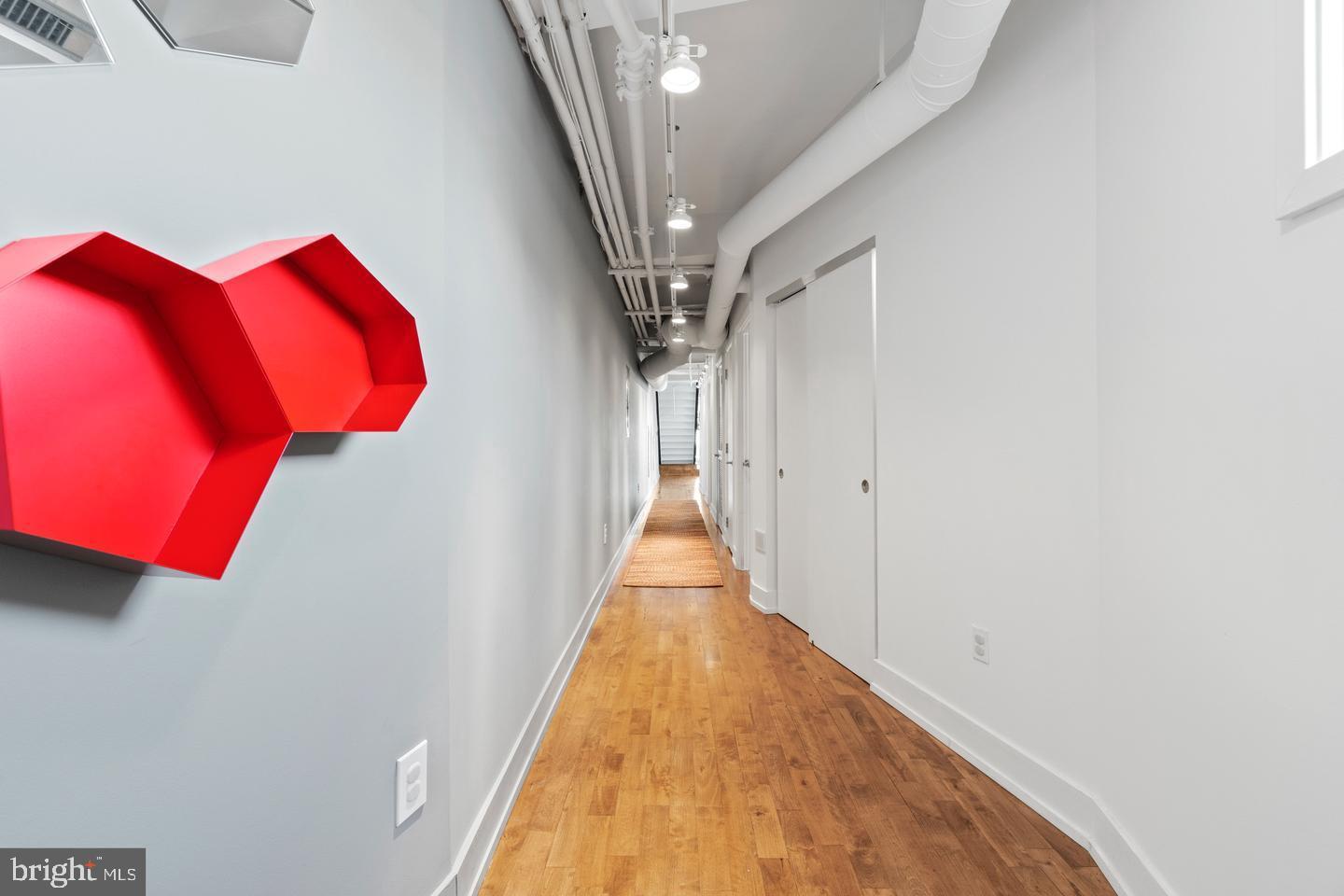 1700 Kalorama Road Northwest, Unit PH502 Washington, DC 20009 - Photo 24 of 50 a view of a hallway with staircase