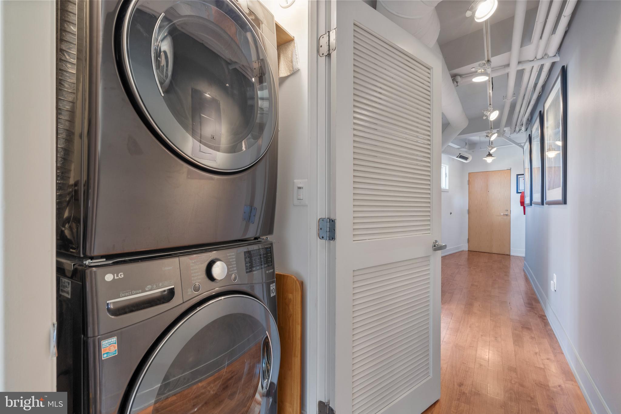 1700 Kalorama Road Northwest, Unit PH502 Washington, DC 20009 - Photo 25 of 50 a view of a bathroom with a washer and dryer