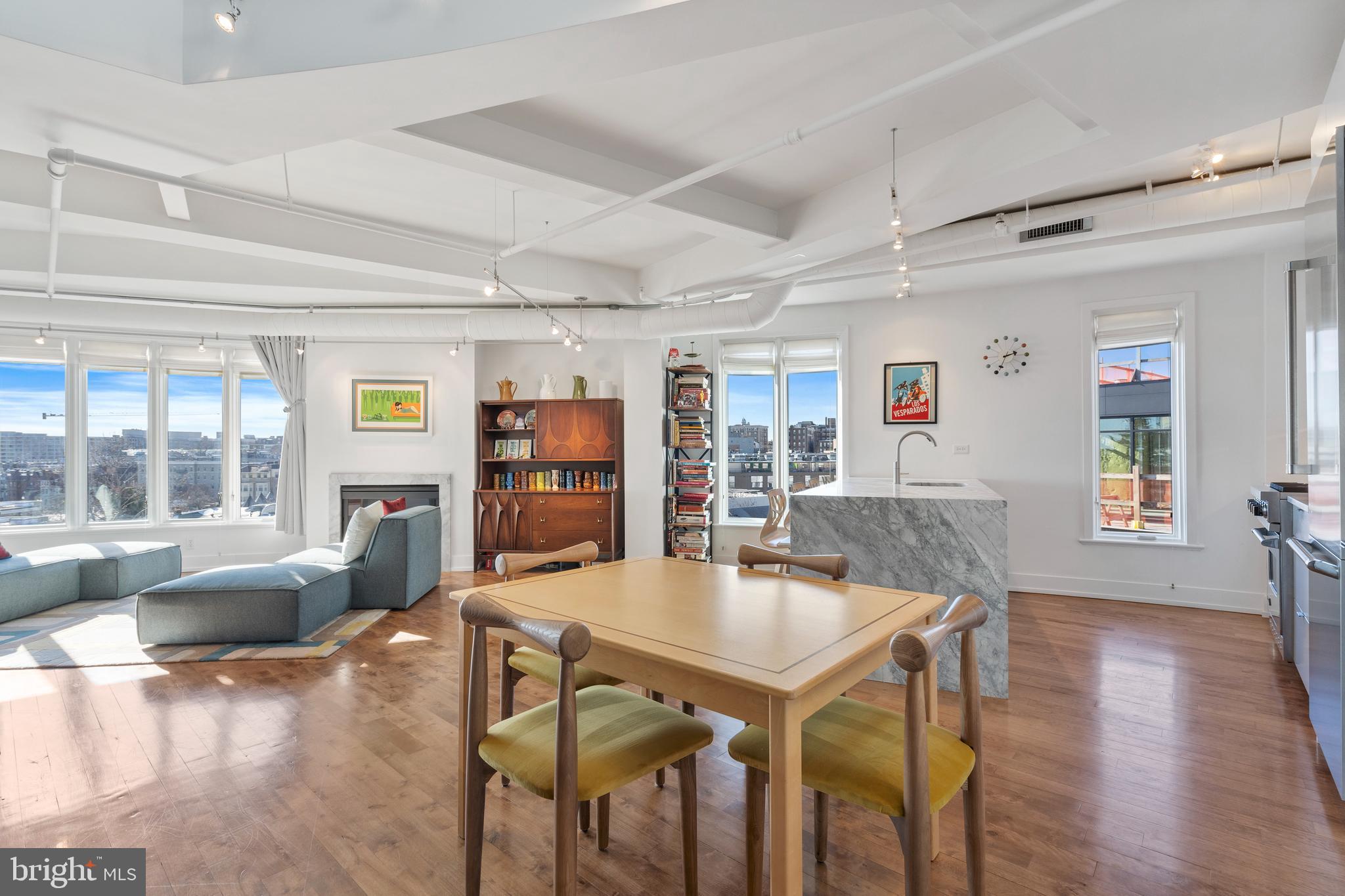 1700 Kalorama Road Northwest, Unit PH502 Washington, DC 20009 - Photo 8 of 50 a view of a dining room with furniture and wooden floor
