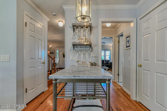 a very nice looking dining room with a table and chairs