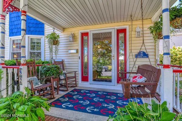 a view of a balcony with wooden floor