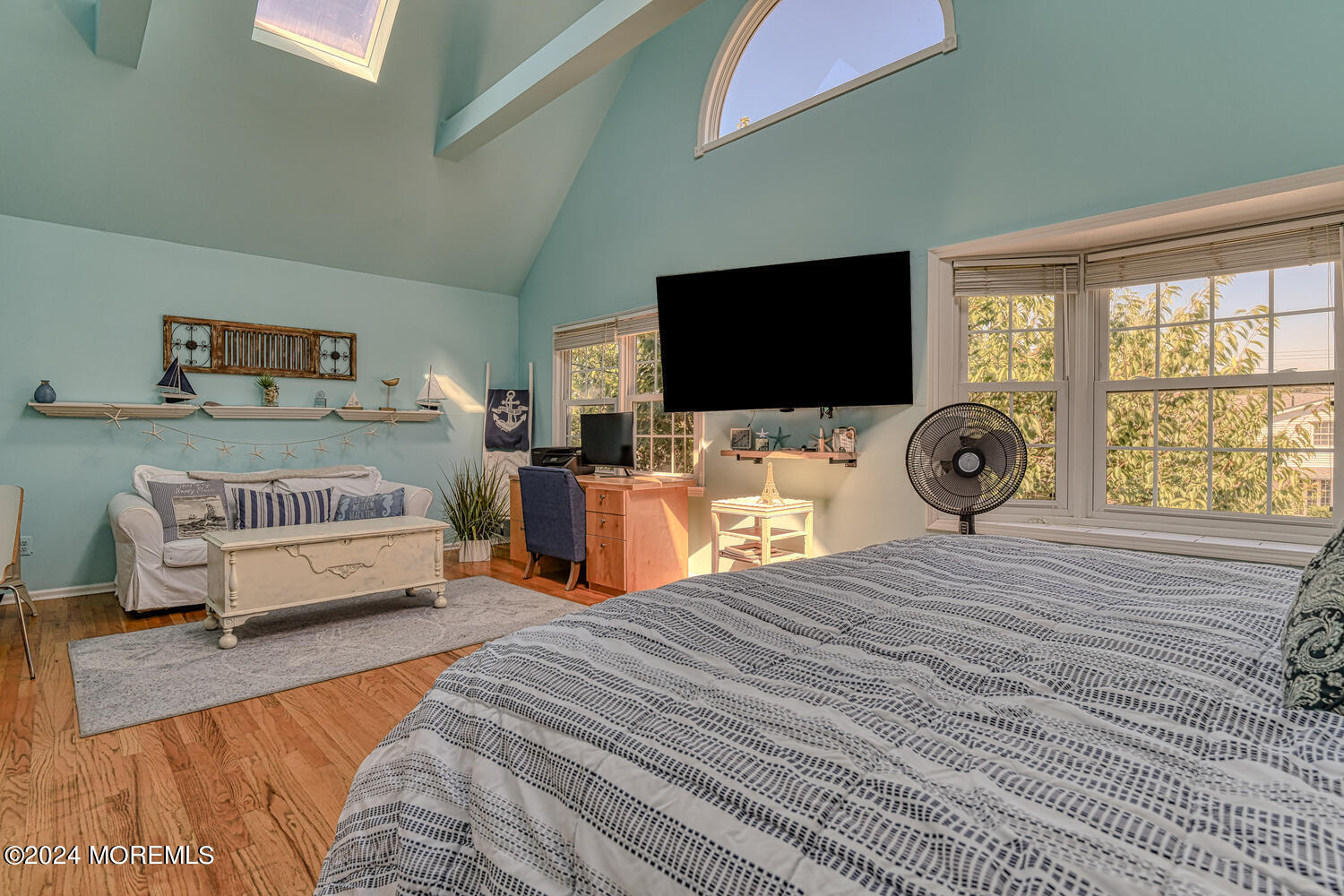 82 Inskip Avenue Ocean Grove, NJ 07756 - Photo 21 of 31 a bedroom with a bed and a flat screen tv