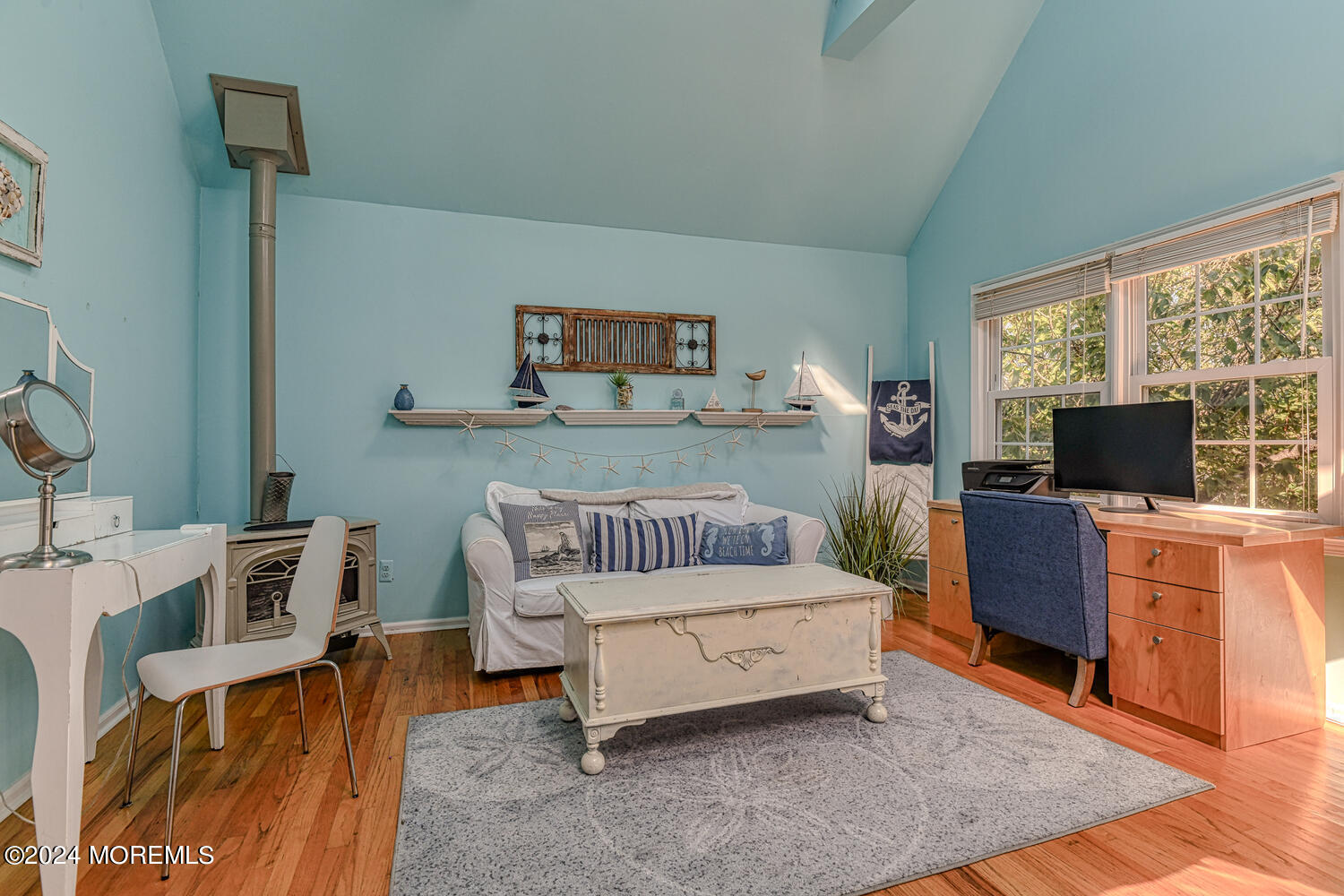 82 Inskip Avenue Ocean Grove, NJ 07756 - Photo 22 of 31 a bedroom with furniture and a flat screen tv