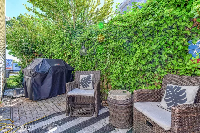 a view of a table and chair in the patio