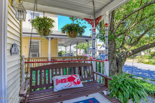 a view of a balcony with wooden floor