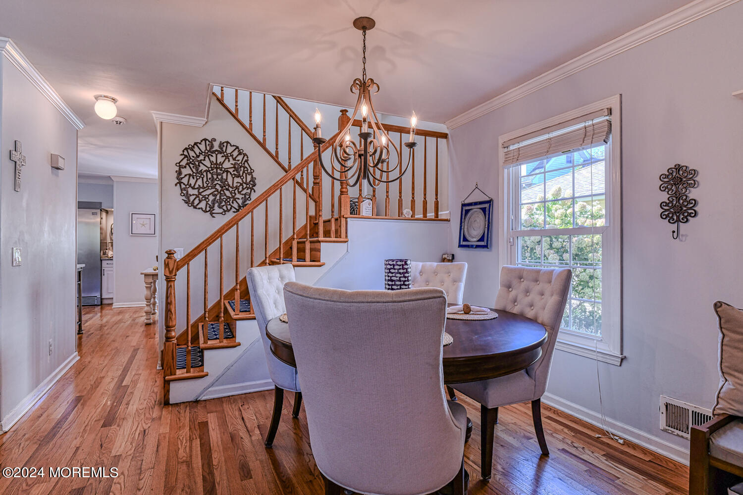 82 Inskip Avenue Ocean Grove, NJ 07756 - Photo 8 of 31 a dining room with furniture entryway and wooden floor
