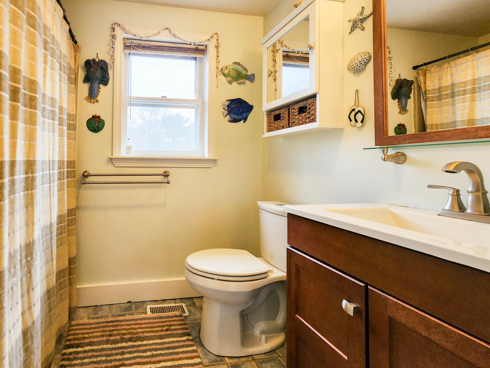 437 Cotuit Road Mashpee, MA 02649 - Photo 12 of 30 a bathroom with a sink and a toilet