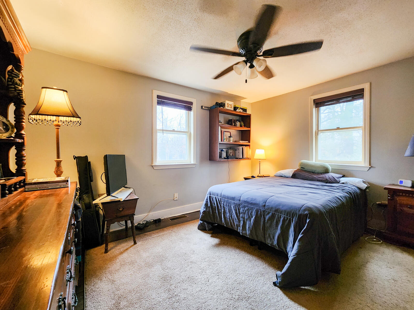 437 Cotuit Road Mashpee, MA 02649 - Photo 15 of 30 a bedroom with a bed gym equipment and a window