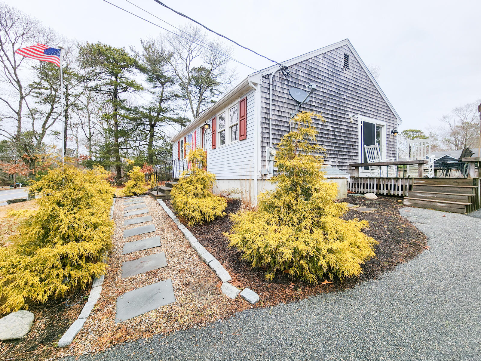 437 Cotuit Road Mashpee, MA 02649 - Photo 2 of 30 a view of a house with a yard