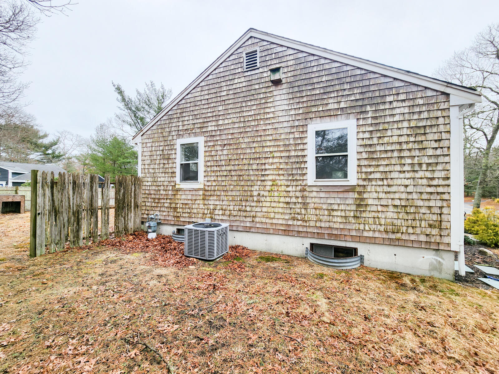437 Cotuit Road Mashpee, MA 02649 - Photo 24 of 30 a front view of a house with patio