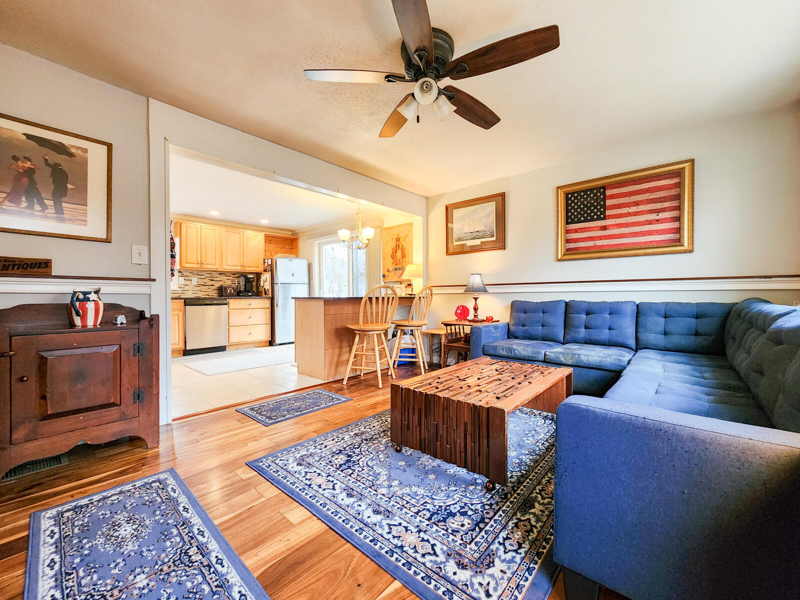 437 Cotuit Road Mashpee, MA 02649 - Photo 3 of 30 a living room with furniture and a rug
