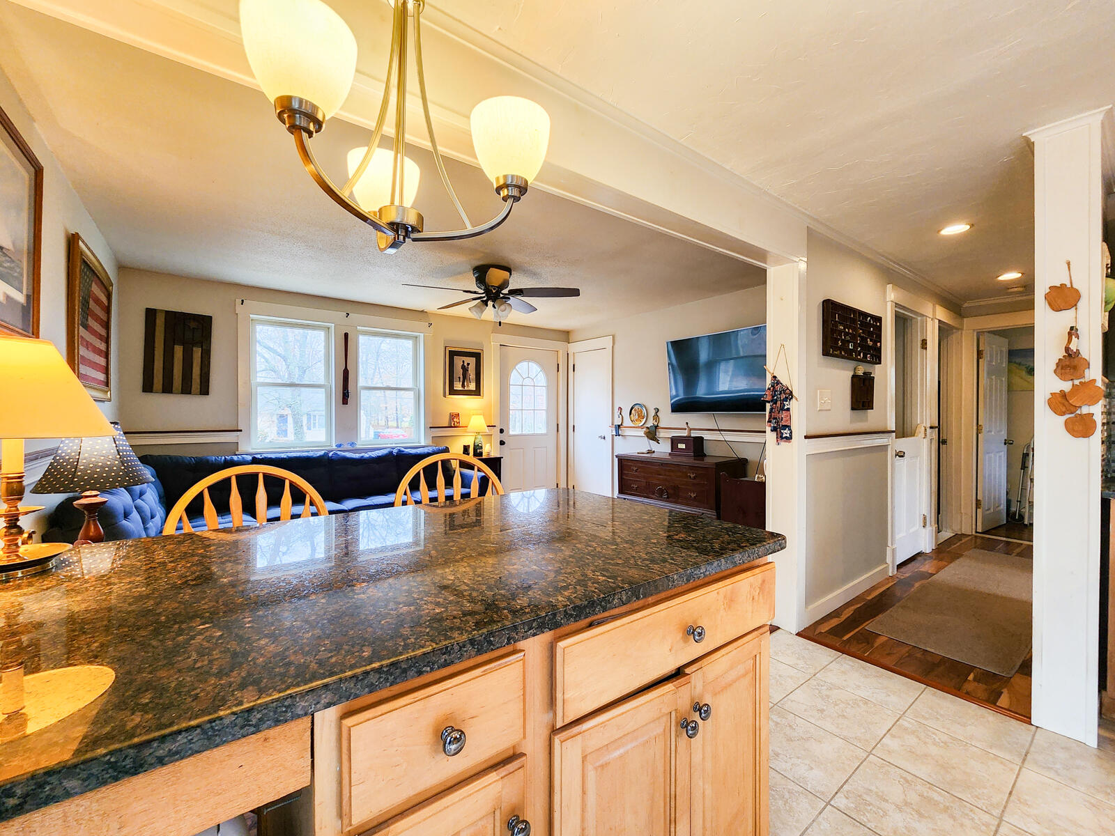 437 Cotuit Road Mashpee, MA 02649 - Photo 5 of 30 a kitchen with stainless steel appliances granite countertop a sink a oven and refrigerator