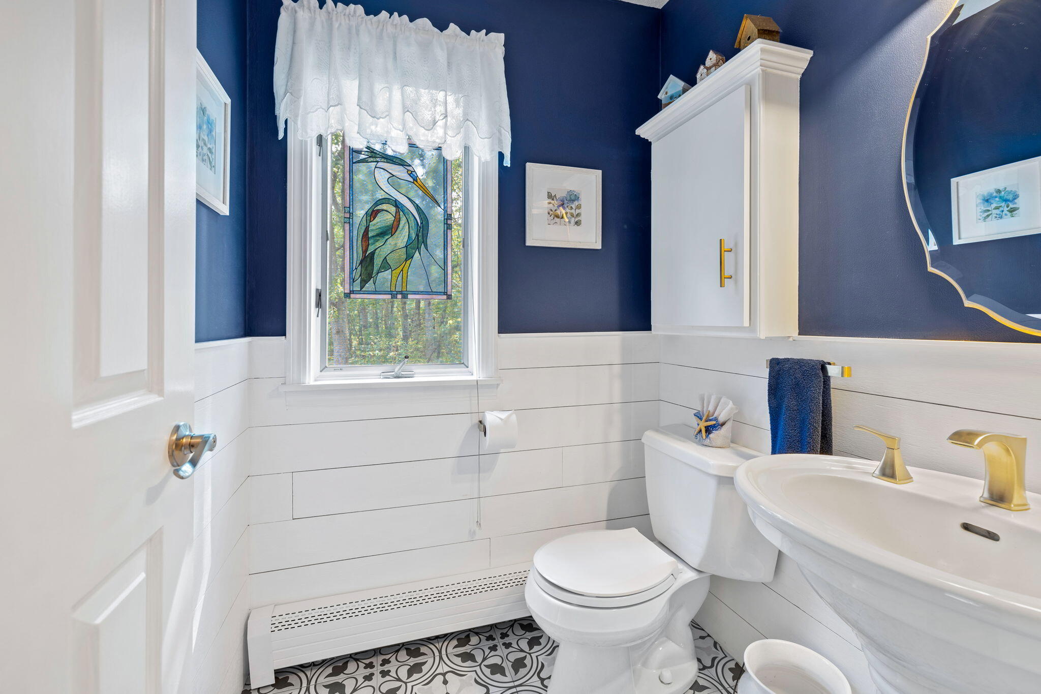 363 Blacksmith Shop Road East Falmouth, MA 02536 - Photo 16 of 40 a bathroom with a sink and a toilet