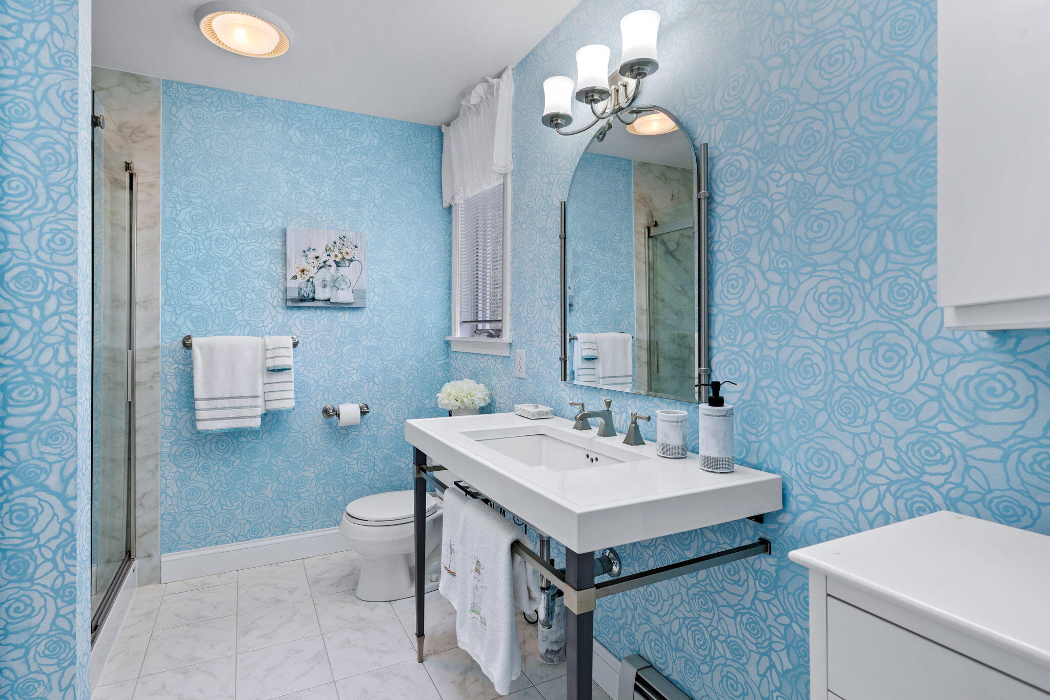 363 Blacksmith Shop Road East Falmouth, MA 02536 - Photo 20 of 40 a bathroom with a sink vanity and a mirror