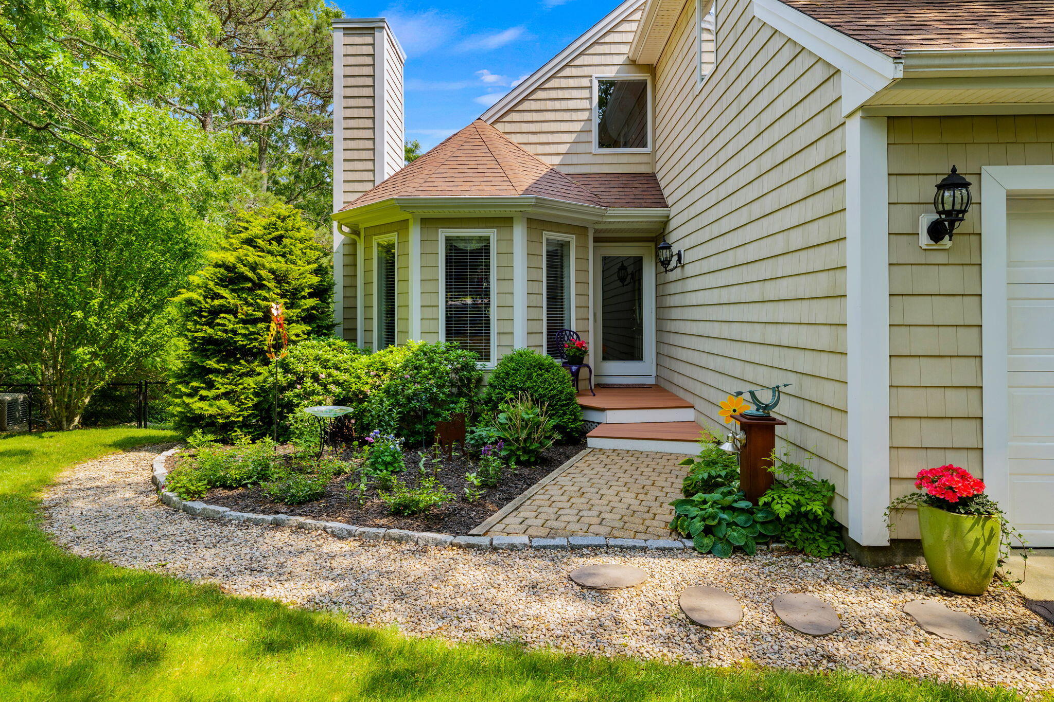 363 Blacksmith Shop Road East Falmouth, MA 02536 - Photo 2 of 40 a view of a house with potted plants