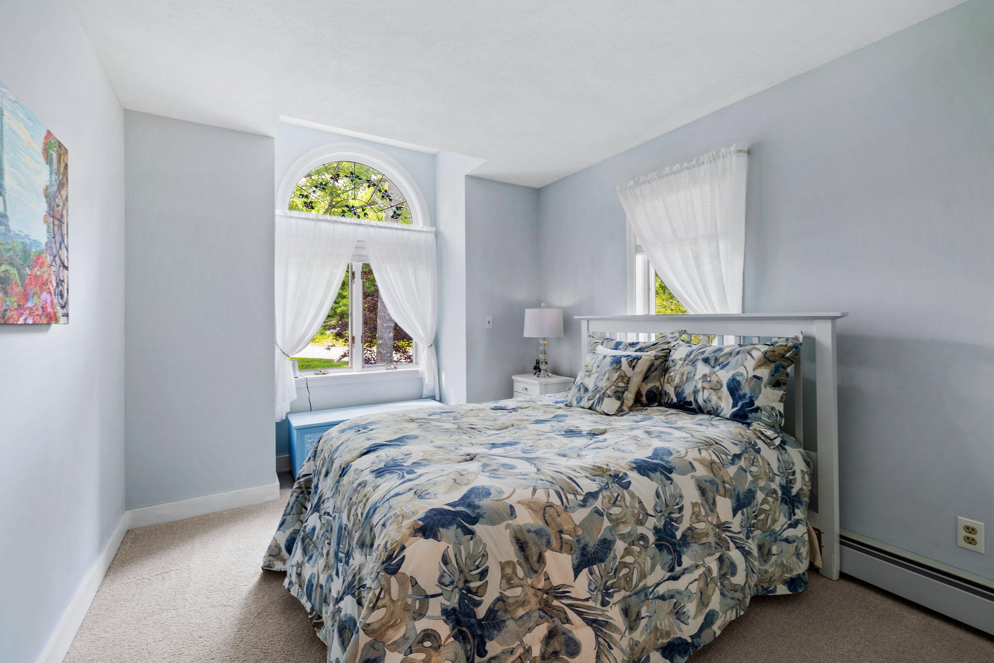 363 Blacksmith Shop Road East Falmouth, MA 02536 - Photo 23 of 40 a bedroom with a bed and painting on the wall