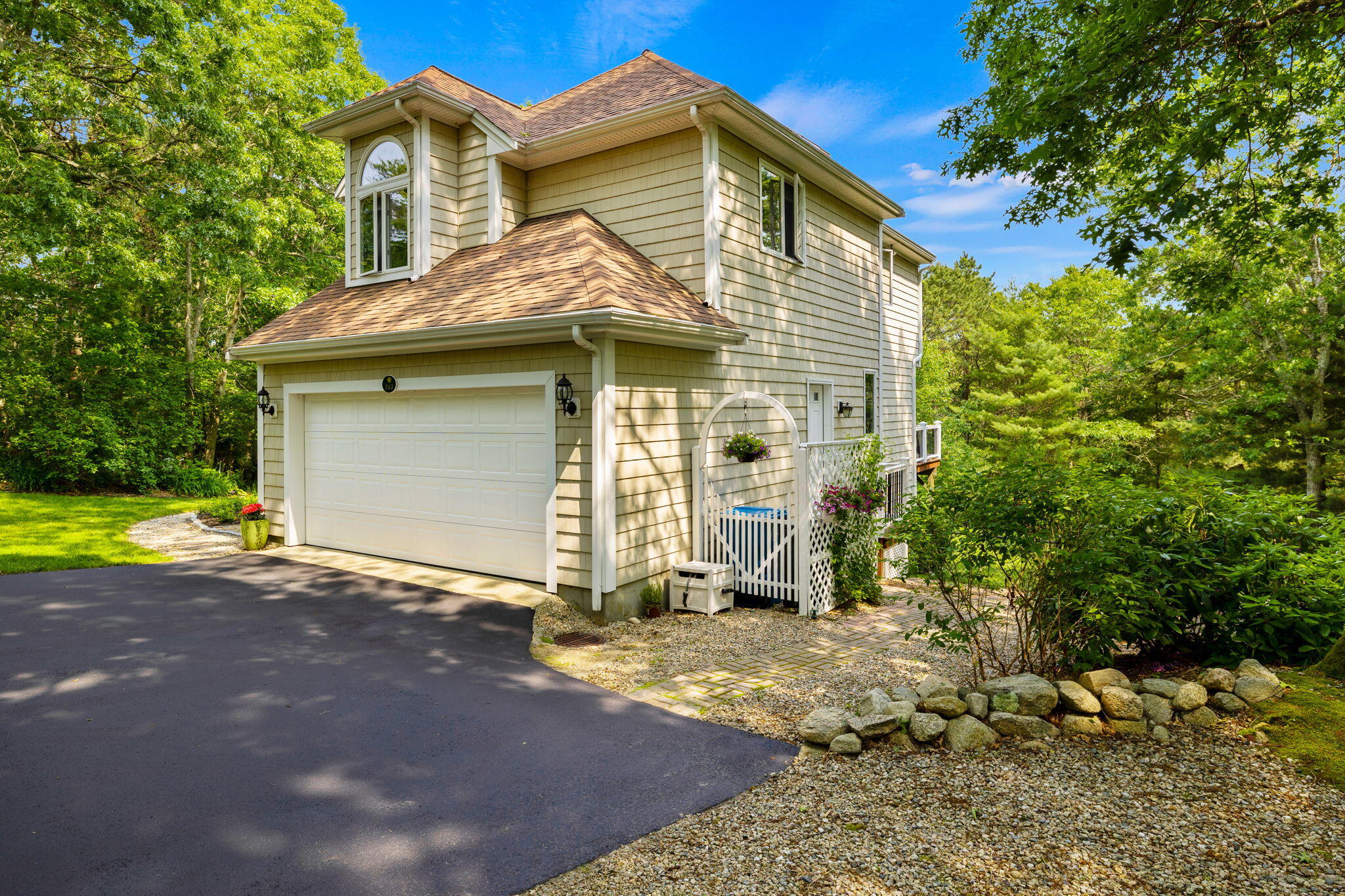 363 Blacksmith Shop Road East Falmouth, MA 02536 - Photo 31 of 40 a view of a house with a yard