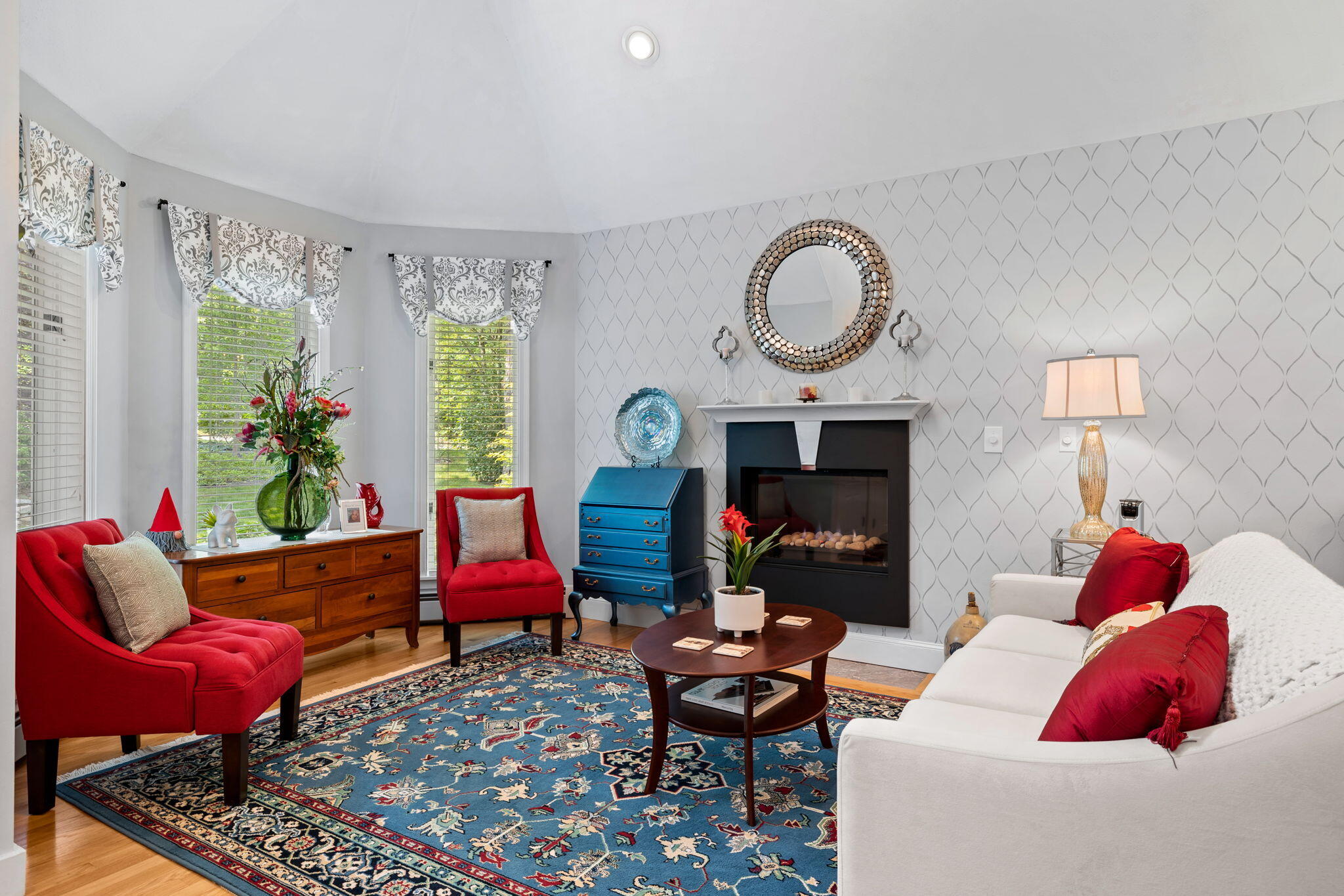 363 Blacksmith Shop Road East Falmouth, MA 02536 - Photo 5 of 40 a living room with furniture and a fireplace