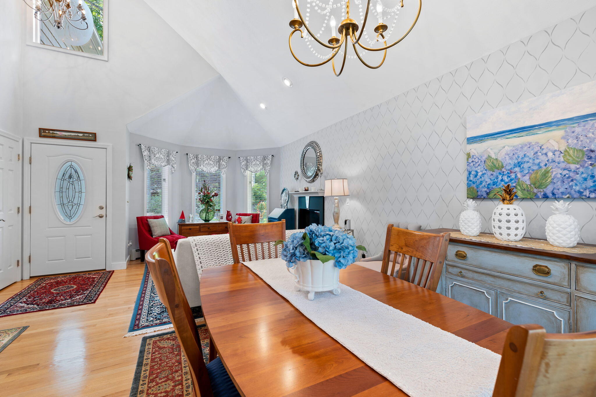 363 Blacksmith Shop Road East Falmouth, MA 02536 - Photo 8 of 40 a living room with furniture and a wooden floor