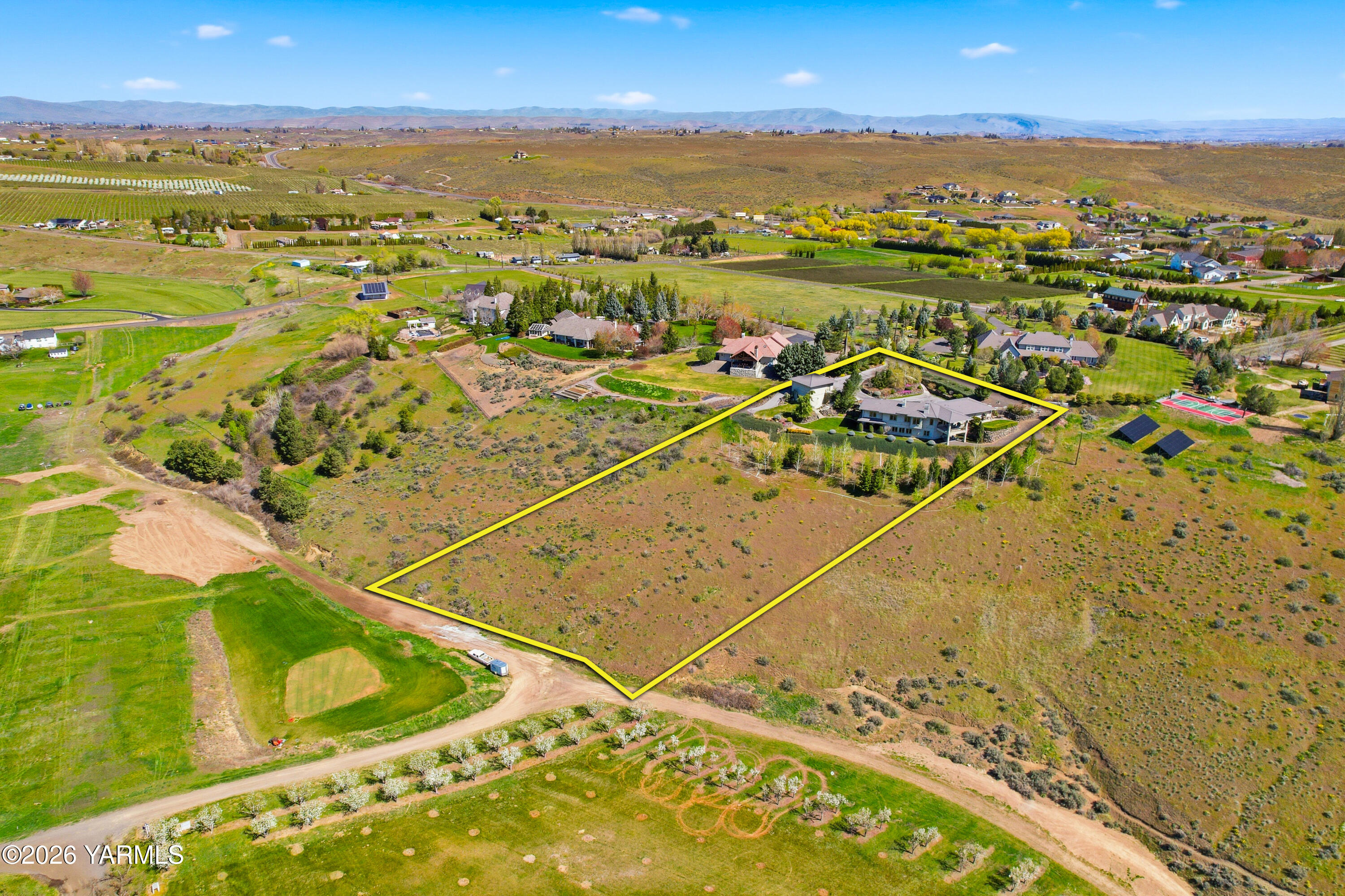 660 Noble Hill Road Yakima, WA 98908 - Photo 59 of 63 an aerial view of residential houses with outdoor space