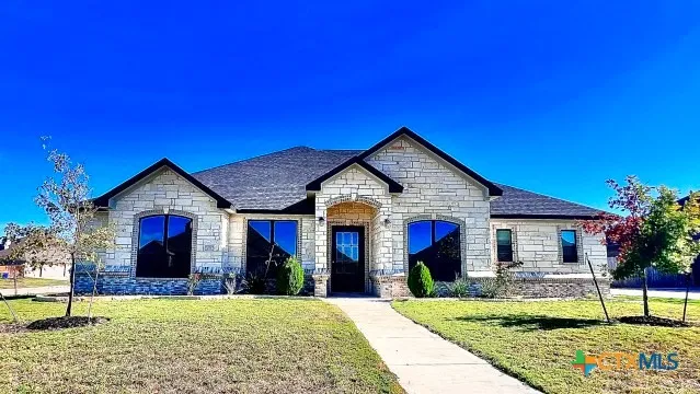 a front view of a house with a porch