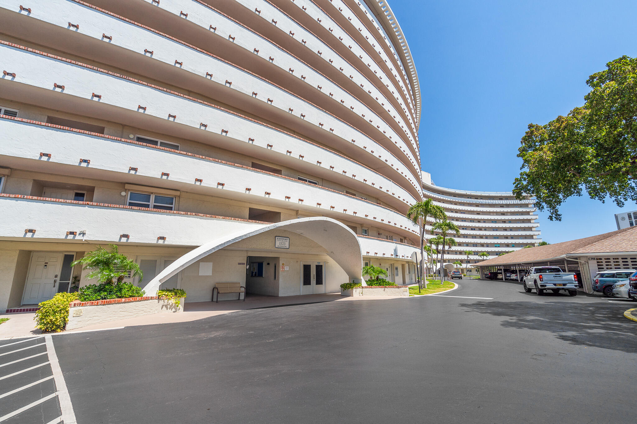1523 East Hillsboro Boulevard, Unit 531 Deerfield Beach, FL 33441 - Photo 67 of 71 a front view of a building with street
