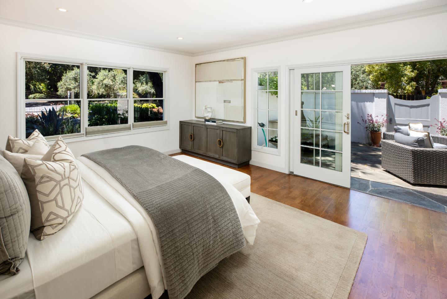 296 Greenoaks Drive Atherton, CA 94027 - Photo 14 of 21 a spacious bedroom with a bed and glass window