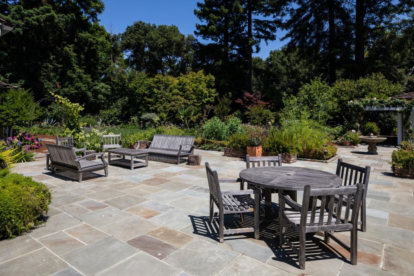 296 Greenoaks Drive Atherton, CA 94027 - Photo 19 of 21 a view of a dinning table and chairs in the patio