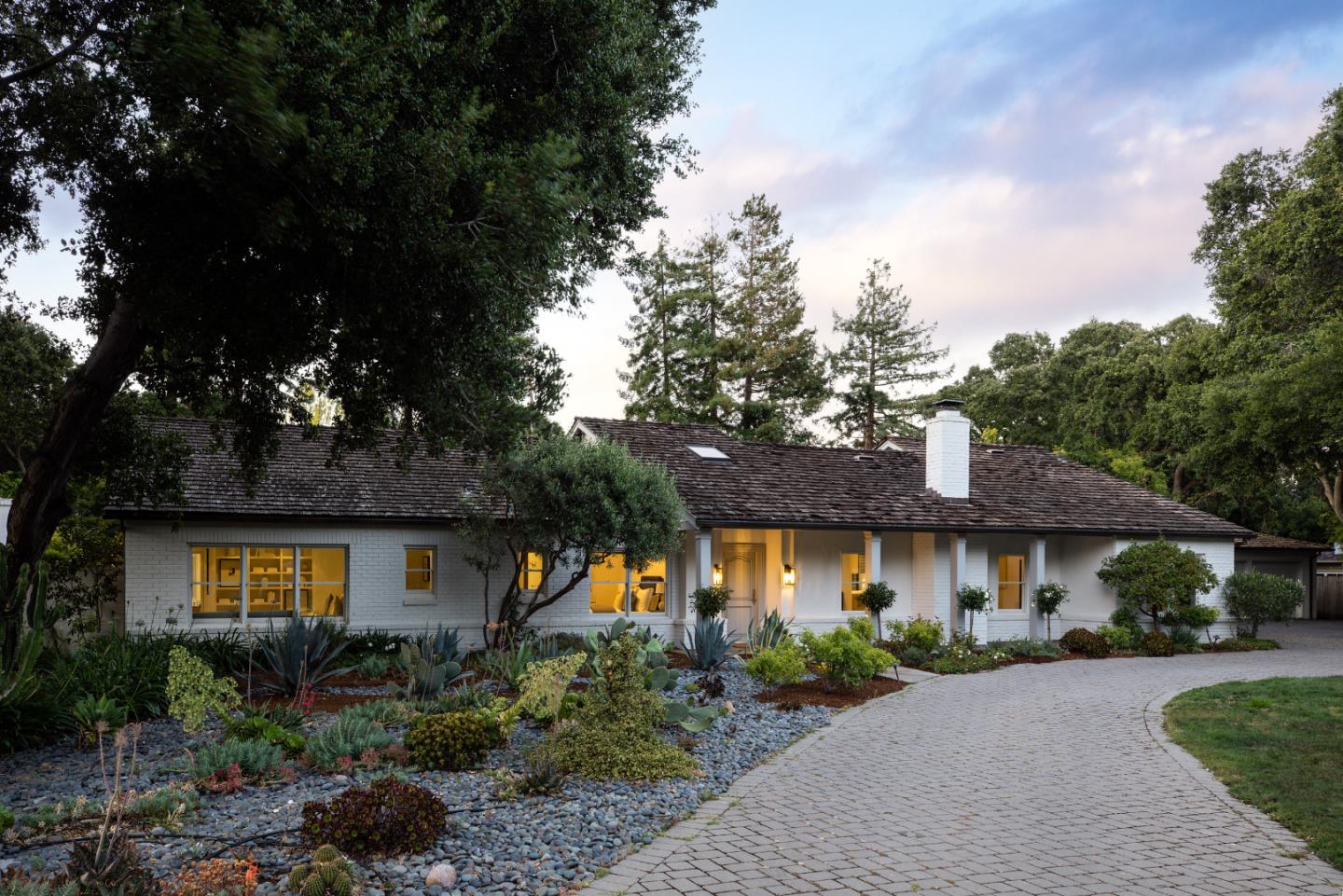 296 Greenoaks Drive Atherton, CA 94027 - Photo 2 of 21 a front view of a house with garden