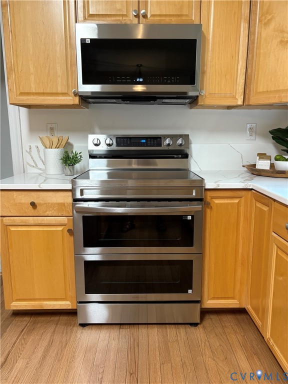 4156 Royal Ridge Court Louisa, VA 23093 - Photo 20 of 50 a kitchen with a stove and a microwave