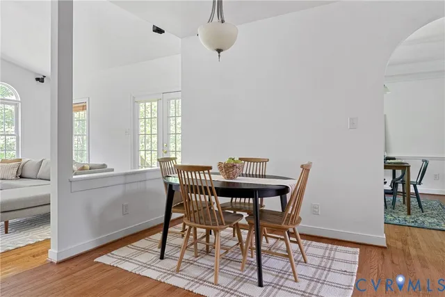 a view of a house with a yard and garage