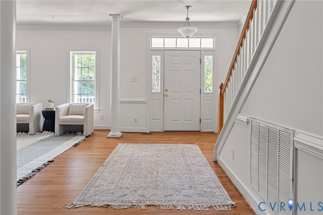 4156 Royal Ridge Court Louisa, VA 23093 - Photo 7 of 50 a view of a bedroom with furniture and staircase