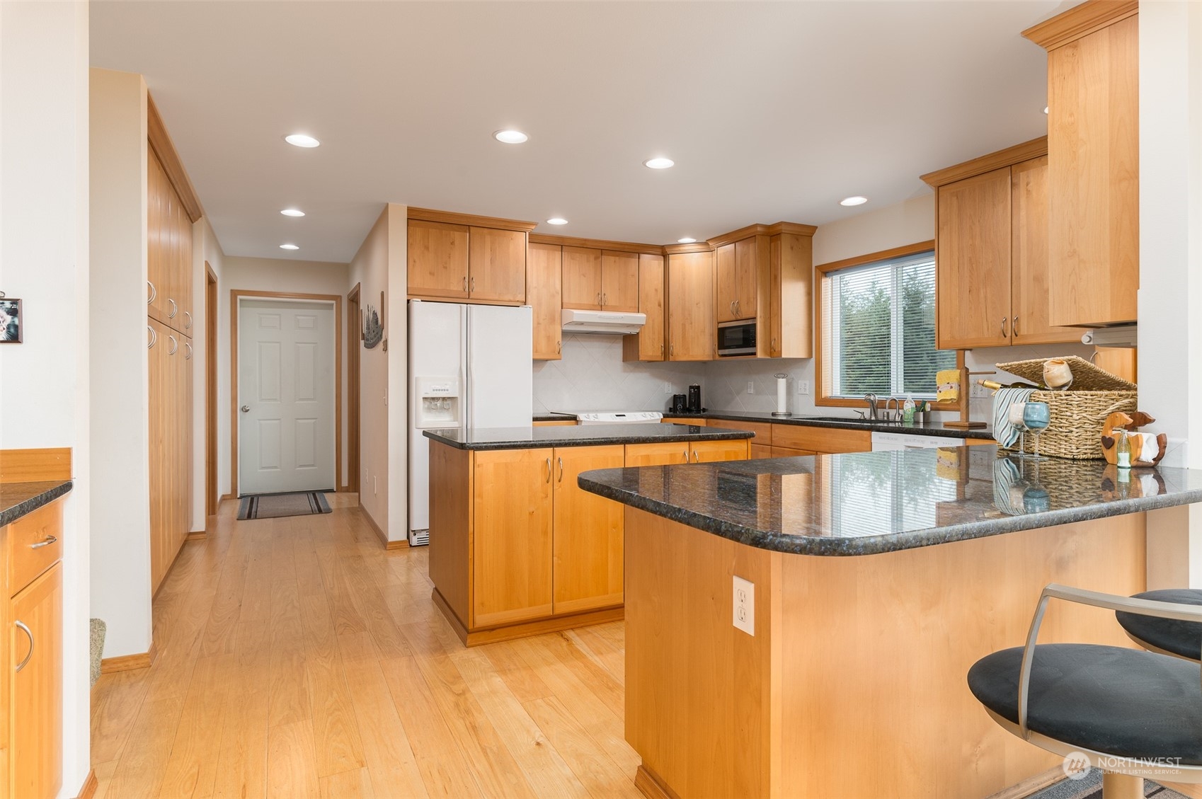 2131 Central Road Everson, WA 98247 - Photo 15 of 40 a kitchen with stainless steel appliances granite countertop a sink a stove and a refrigerator