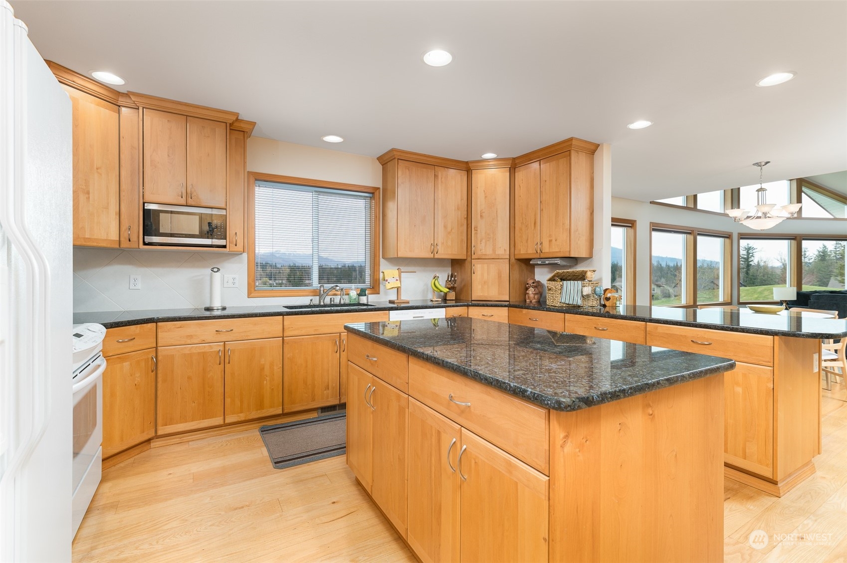 2131 Central Road Everson, WA 98247 - Photo 16 of 40 a kitchen with stainless steel appliances granite countertop refrigerator sink and cabinets