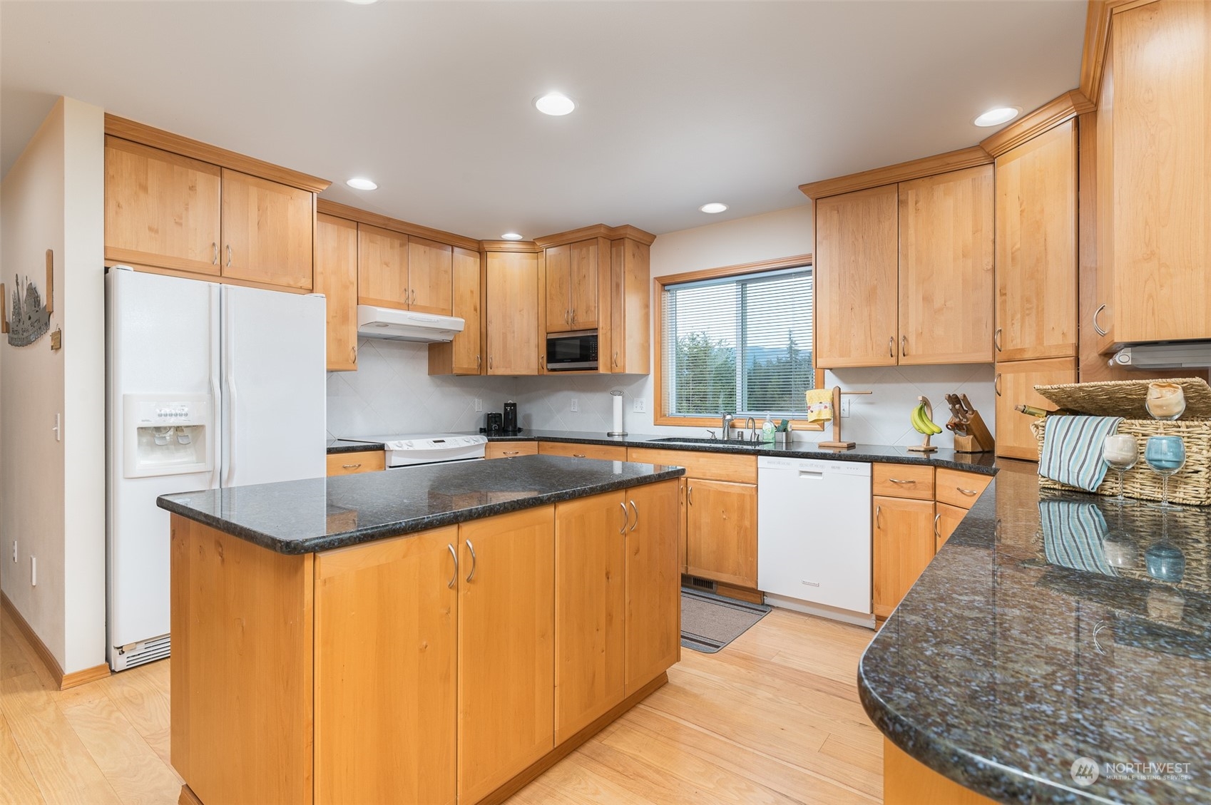 2131 Central Road Everson, WA 98247 - Photo 17 of 40 a kitchen with stainless steel appliances granite countertop a refrigerator sink and cabinets