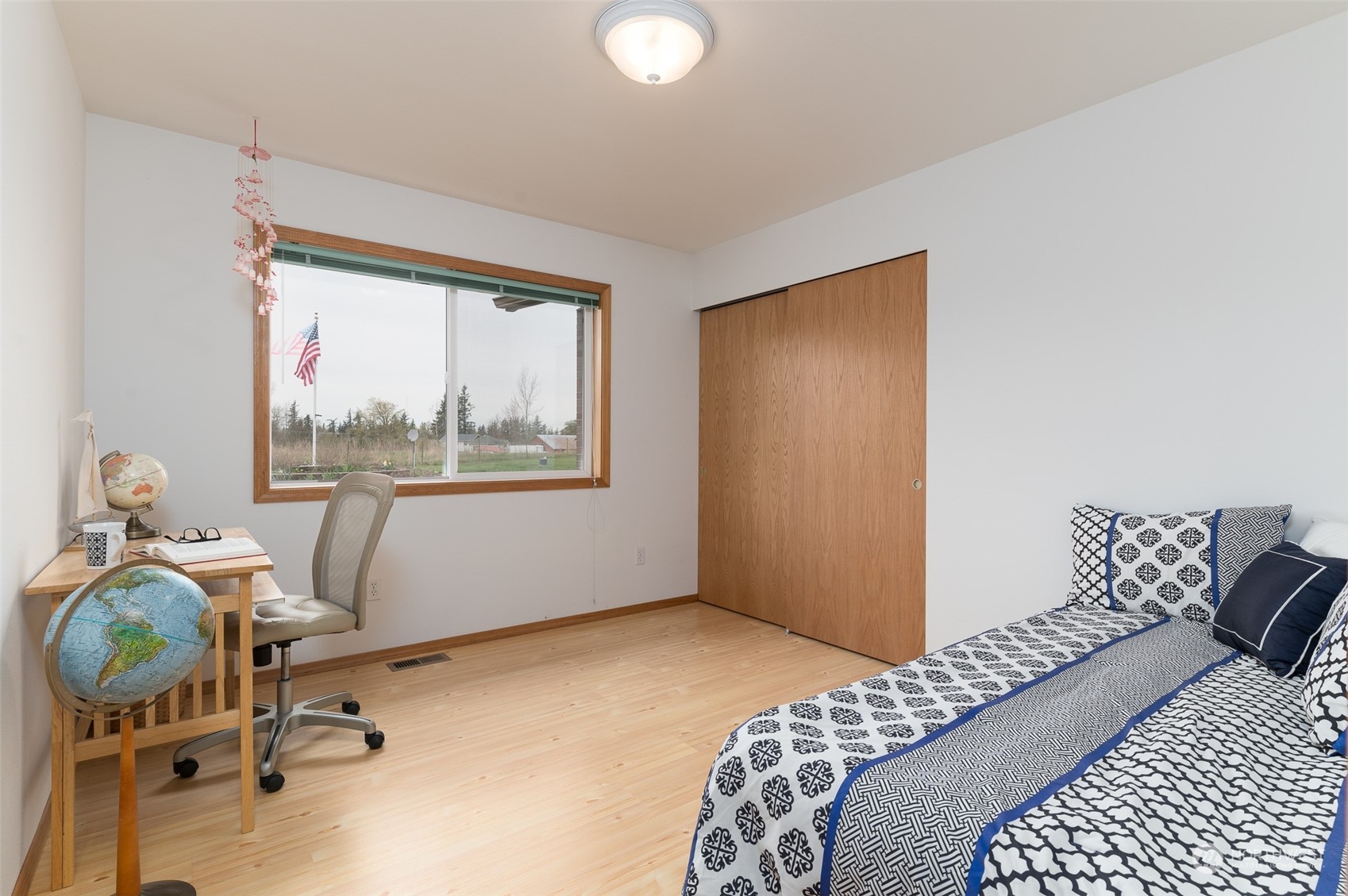 2131 Central Road Everson, WA 98247 - Photo 22 of 40 a bedroom with a bed and wooden floor