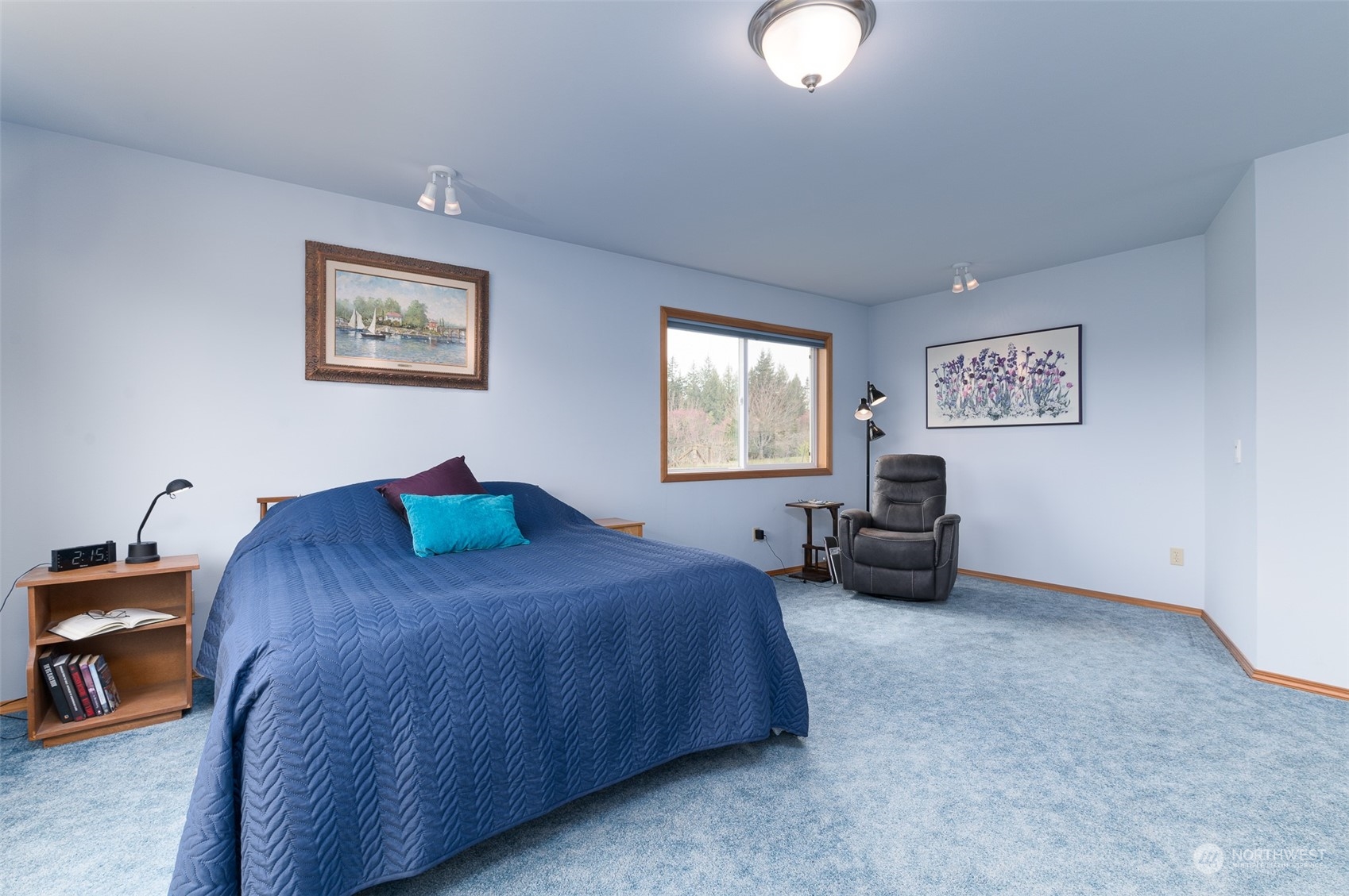 2131 Central Road Everson, WA 98247 - Photo 25 of 40 a bedroom with bed and a chandelier