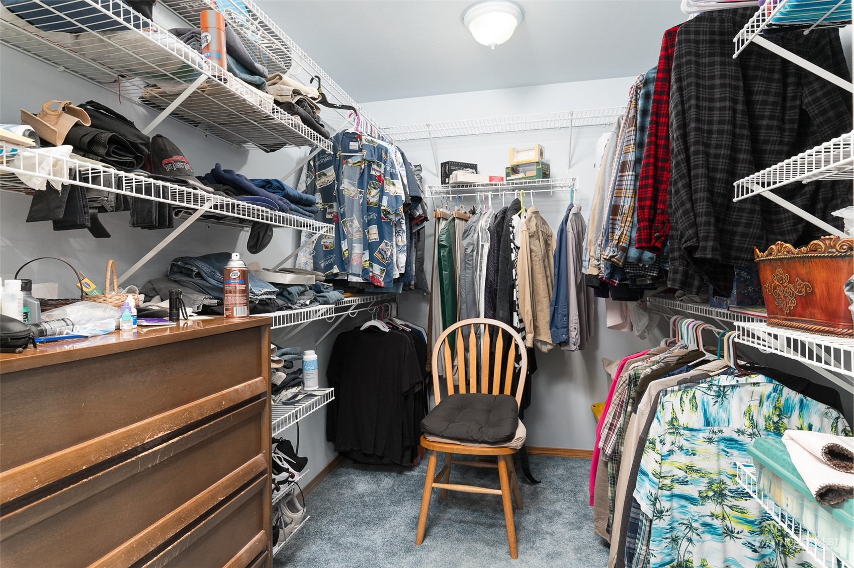 2131 Central Road Everson, WA 98247 - Photo 28 of 40 a view of walk in closet with clothes and shoes