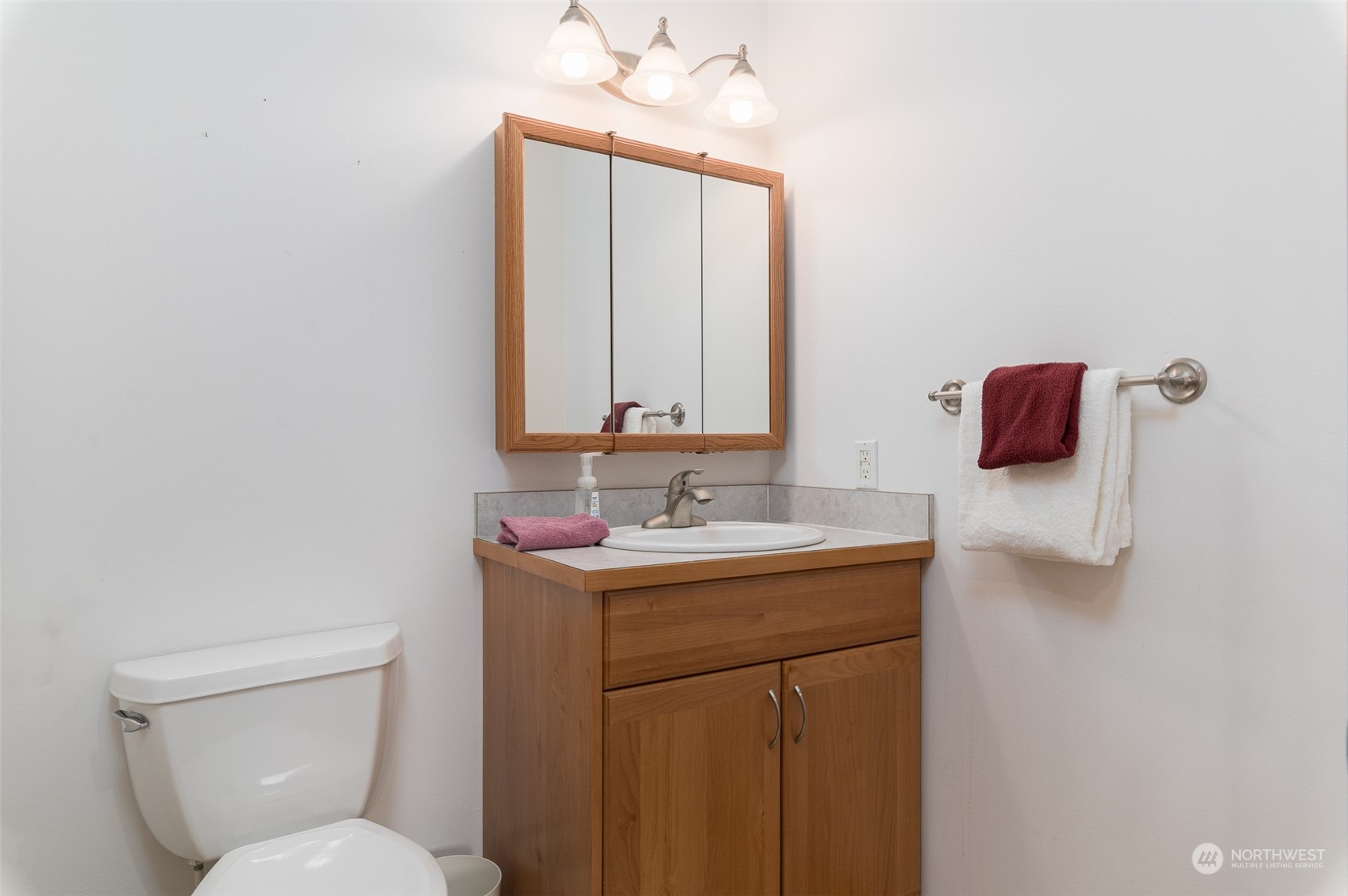 2131 Central Road Everson, WA 98247 - Photo 29 of 40 a bathroom with a toilet sink and mirror