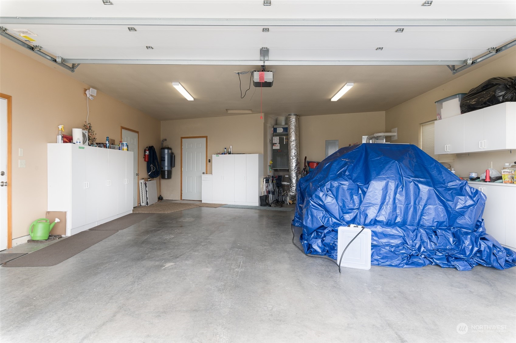 2131 Central Road Everson, WA 98247 - Photo 31 of 40 a view of a livingroom with furniture and a garage
