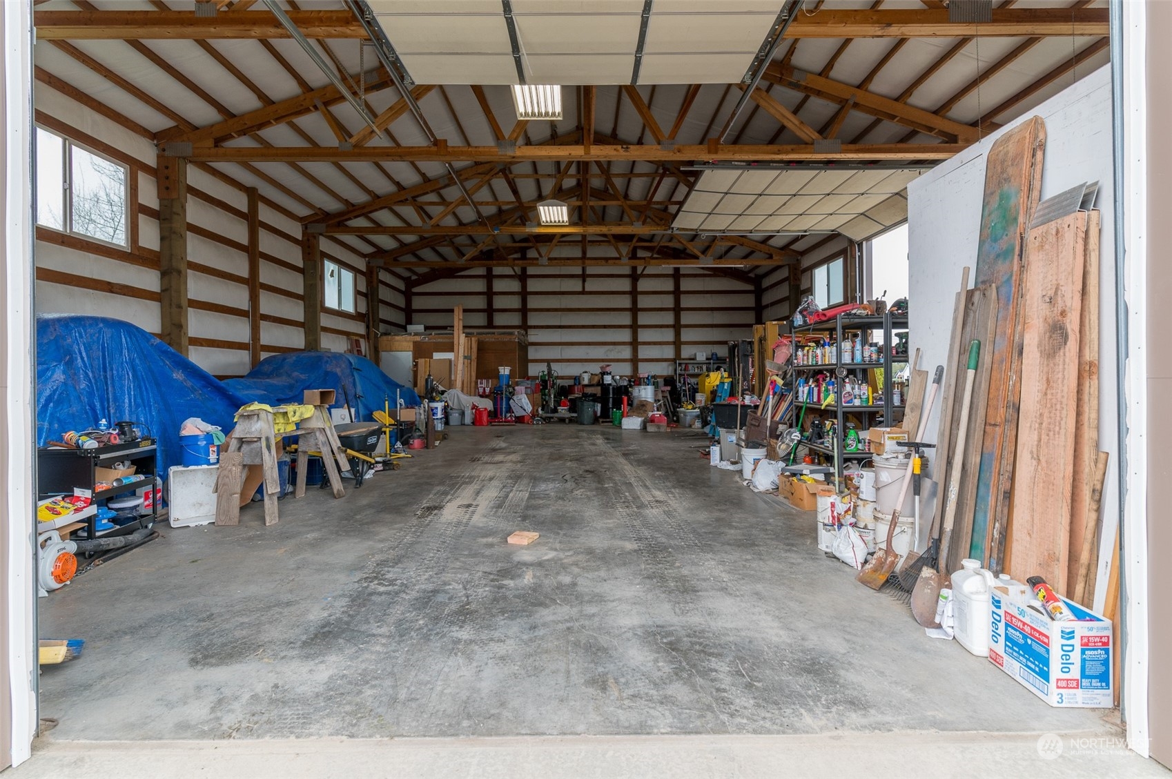 2131 Central Road Everson, WA 98247 - Photo 34 of 40 a view of a storage room with a table and chairs