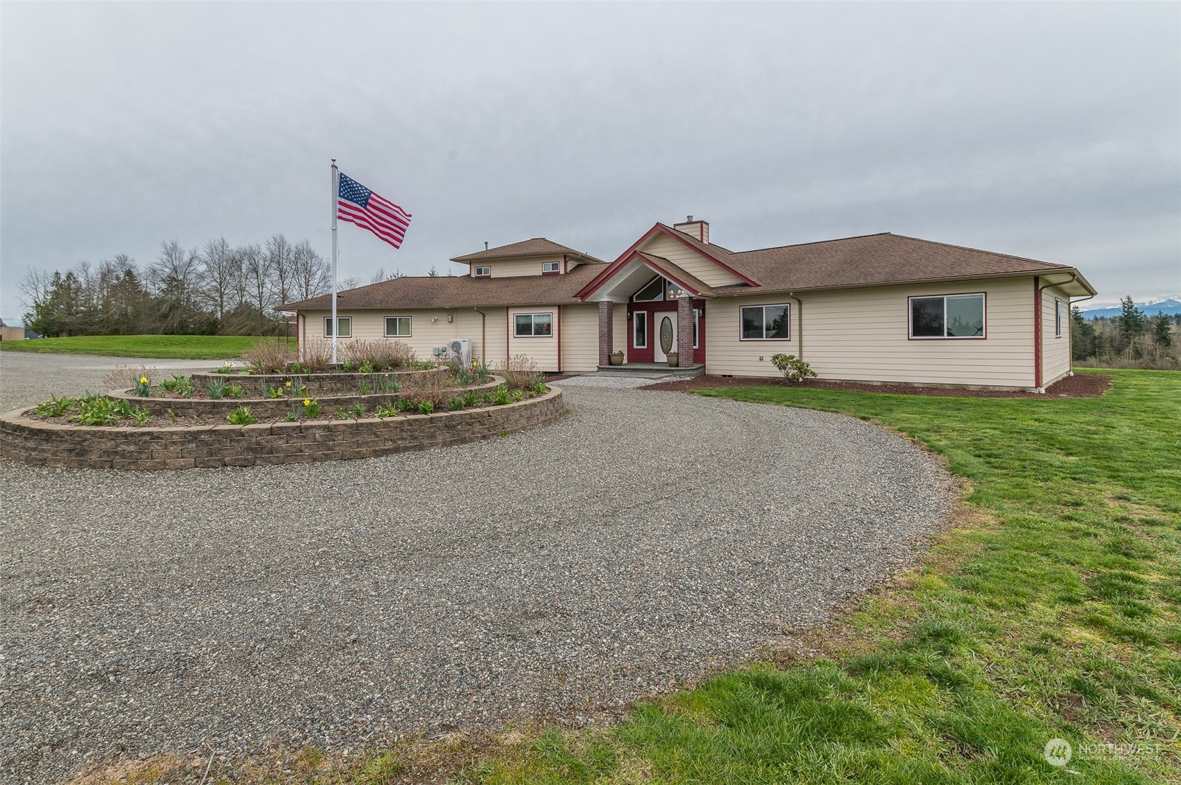 2131 Central Road Everson, WA 98247 - Photo 4 of 40 a front view of a house with a yard and garage