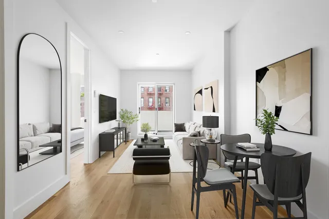 a living room with furniture or couch and a flat screen tv