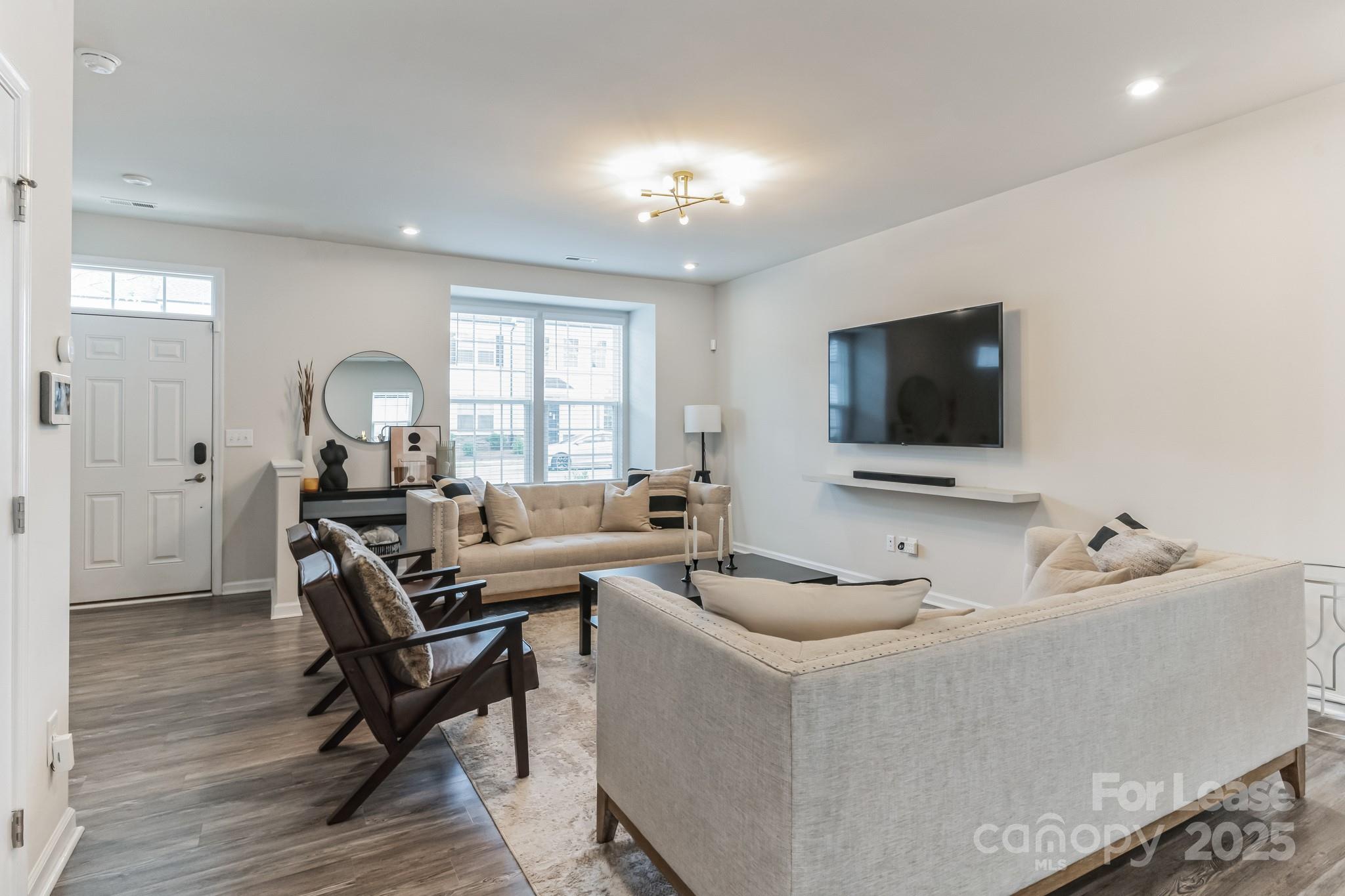 5048 Patton Dr. Gastonia, NC 28056 - Photo 16 of 37 a living room with furniture and a flat screen tv